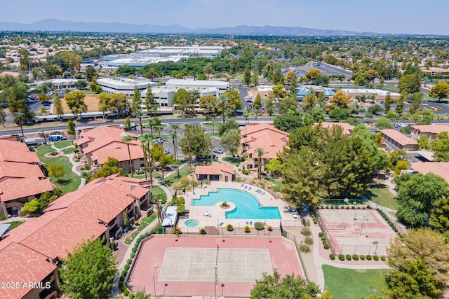 birds eye view of property featuring a mountain view