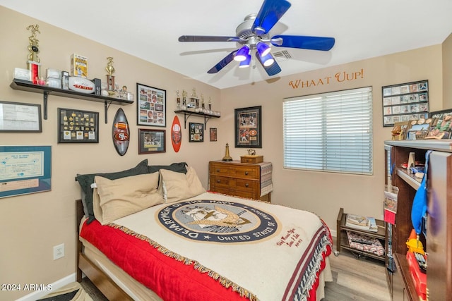 bedroom featuring ceiling fan and light wood-type flooring