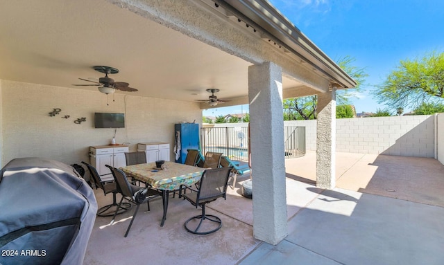 view of patio featuring ceiling fan