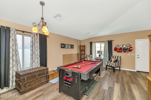 game room featuring wood-type flooring, vaulted ceiling, and billiards