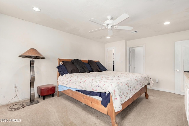 bedroom with visible vents, baseboards, light colored carpet, ceiling fan, and recessed lighting