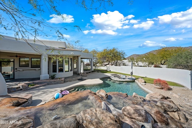 view of swimming pool featuring a patio area