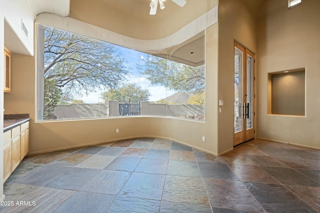 spare room with ceiling fan