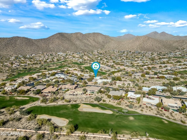 bird's eye view with a mountain view