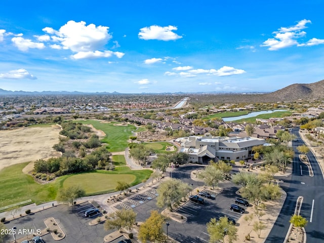 birds eye view of property featuring a mountain view