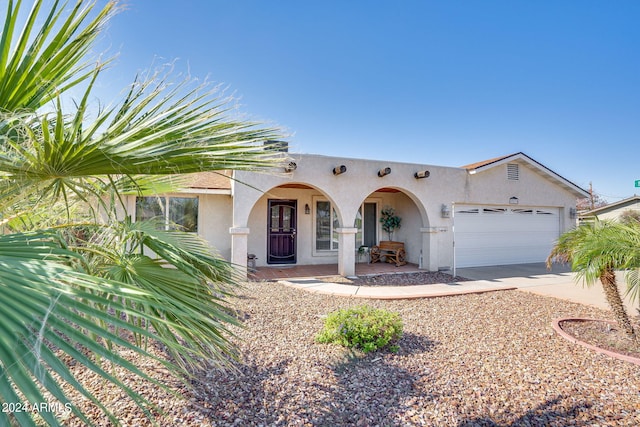 view of front of home with a garage