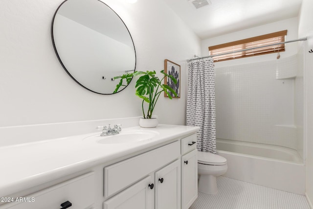 full bathroom featuring tile patterned flooring, vanity, shower / tub combo, and toilet