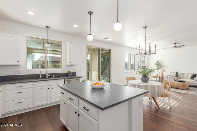 kitchen featuring white cabinetry, sink, ceiling fan with notable chandelier, and dark hardwood / wood-style floors