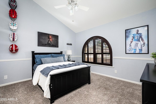 bedroom with vaulted ceiling, ceiling fan, and carpet flooring