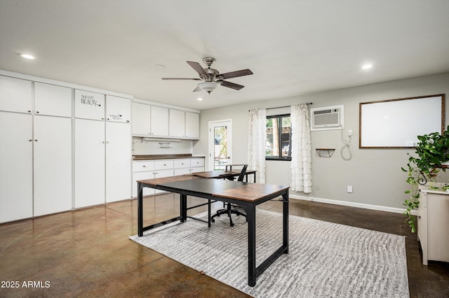 office with ceiling fan and an AC wall unit