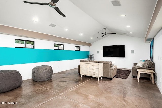 interior space featuring ceiling fan, vaulted ceiling, and concrete flooring