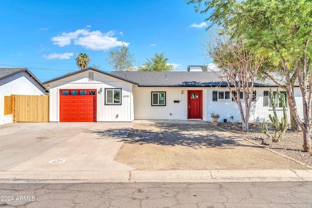 ranch-style home with a garage