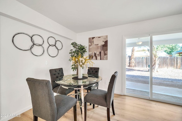 dining space featuring light hardwood / wood-style floors