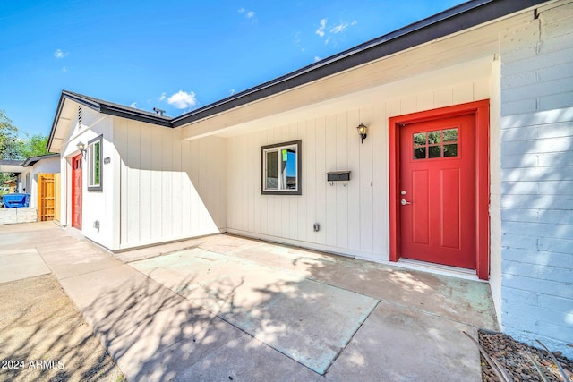 property entrance with a patio