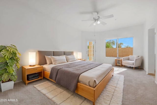 bedroom with ceiling fan and light colored carpet