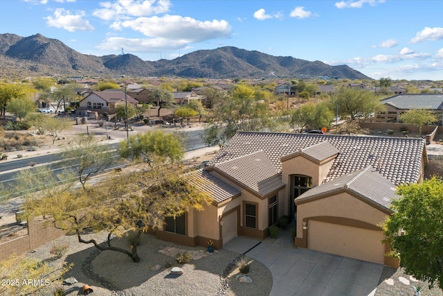 drone / aerial view featuring a mountain view