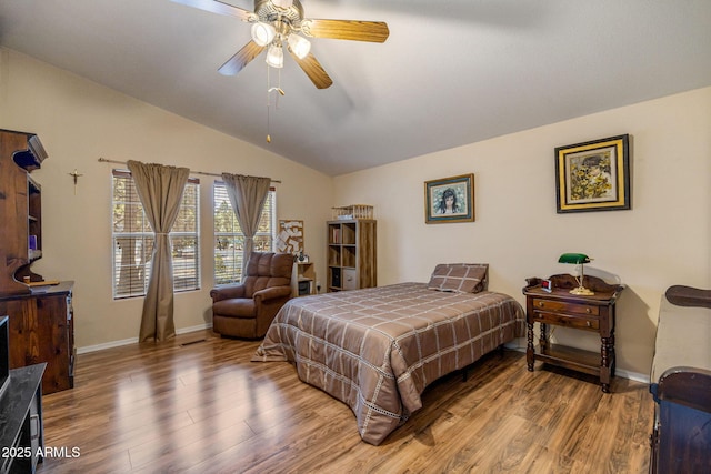 2041 W Hacienda Way, Show Low, AZ 85901 - bedroom featuring wood finished floors, lofted ceiling, baseboards, and ceiling fan