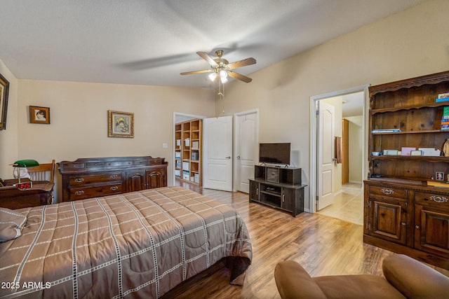 2041 W Hacienda Way, Show Low, AZ 85901 - bedroom featuring wood finished floors and a ceiling fan