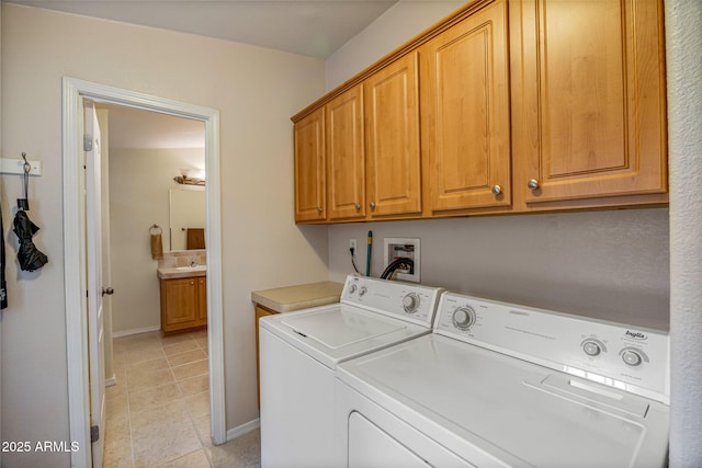 2041 W Hacienda Way, Show Low, AZ 85901 - laundry room with cabinet space, washing machine and dryer, light tile patterned floors, and baseboards