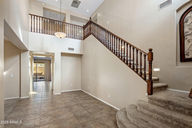 stairway with a high ceiling