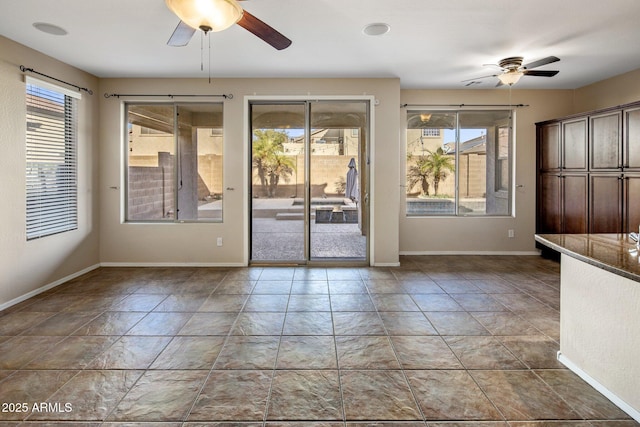 entryway with ceiling fan