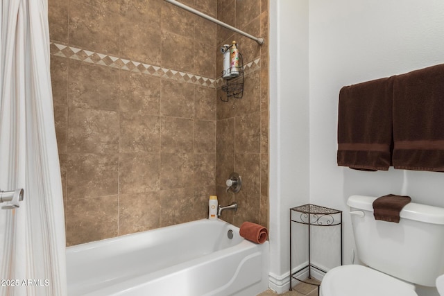 bathroom featuring shower / bath combination with curtain and toilet