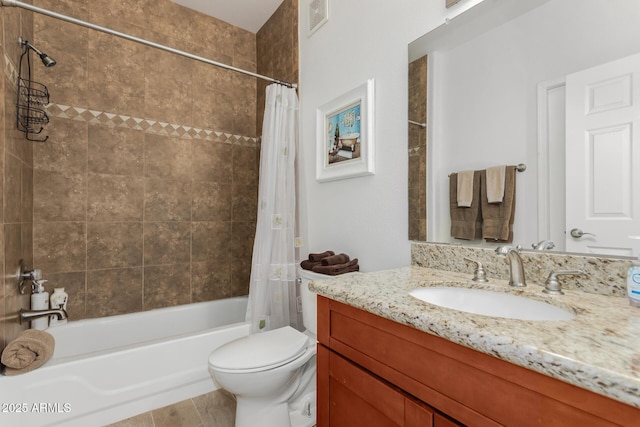 full bathroom featuring vanity, shower / tub combo, toilet, and visible vents