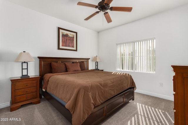 bedroom featuring carpet flooring, baseboards, and ceiling fan