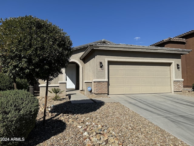 view of front of house with a garage