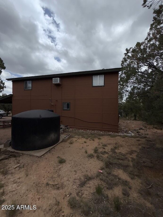 691 N Pyle Ranch Rd, Payson, AZ 85541 - view of home's exterior featuring a wall mounted AC