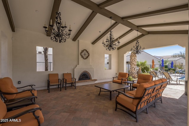 view of patio / terrace featuring an outdoor living space with a fireplace