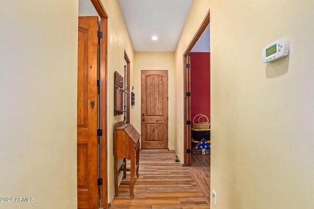 garage featuring electric panel and a garage door opener