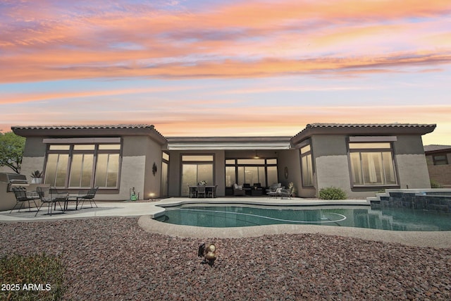 42429 N Cross Timbers Ct, Anthem, AZ 85086 - view of swimming pool featuring a patio area and a pool with connected hot tub