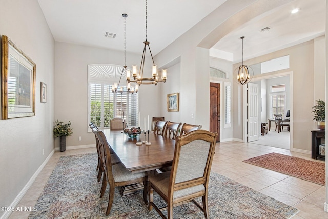42429 N Cross Timbers Ct, Anthem, AZ 85086 - dining area with a chandelier, healthy amount of natural light, and light tile patterned flooring