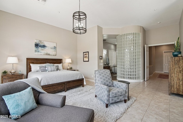 42429 N Cross Timbers Ct, Anthem, AZ 85086 - bedroom with baseboards, light tile patterned flooring, and a chandelier