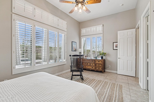 42429 N Cross Timbers Ct, Anthem, AZ 85086 - bedroom featuring light tile patterned flooring, baseboards, and a ceiling fan