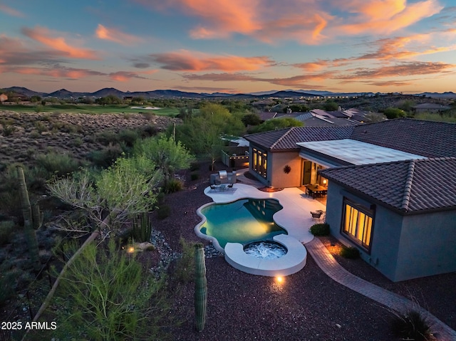 42429 N Cross Timbers Ct, Anthem, AZ 85086 - outdoor pool with a mountain view, a patio, a fenced backyard, and an outdoor fire pit