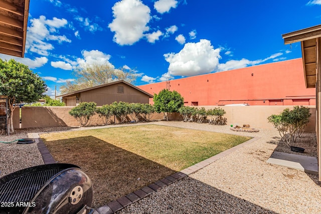 view of yard featuring a fenced backyard