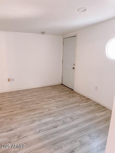 627 N H Ave, Douglas, AZ 85607 - empty room featuring light wood-style flooring and baseboards