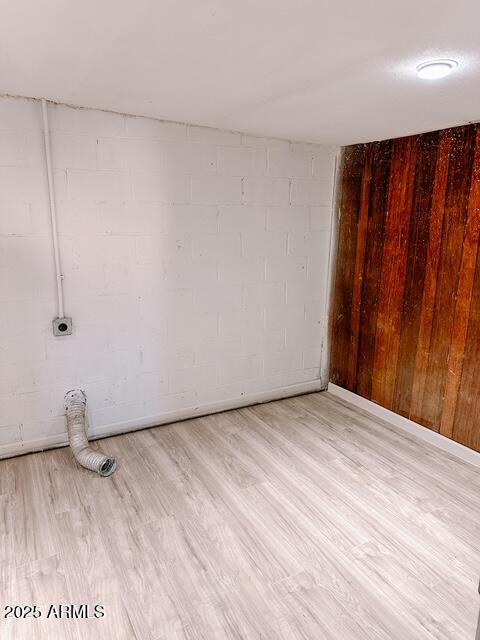 627 N H Ave, Douglas, AZ 85607 - unfurnished room featuring concrete block wall and wood finished floors