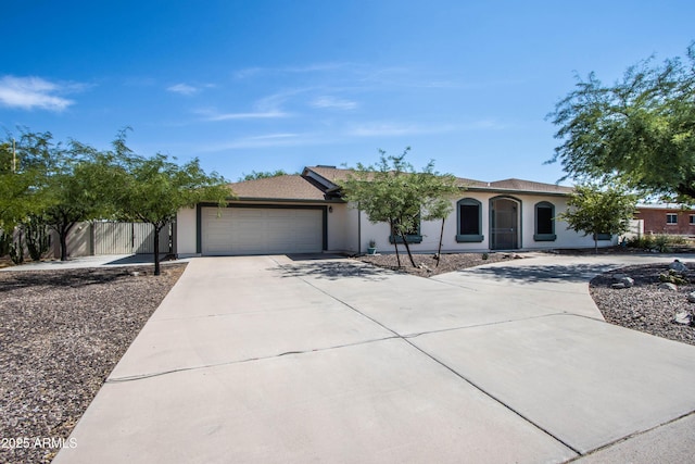 6334 E Albany St, Mesa, AZ 85205 - single story home featuring concrete driveway, stucco siding, and a garage