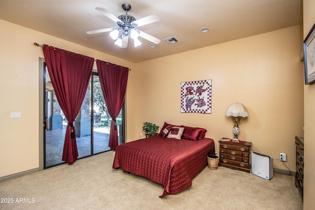 6334 E Albany St, Mesa, AZ 85205 - carpeted bedroom featuring access to exterior, a ceiling fan, and baseboards