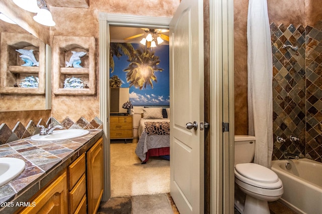 6334 E Albany St, Mesa, AZ 85205 - ensuite bathroom featuring double vanity, ceiling fan, shower / tub combo with curtain, and toilet