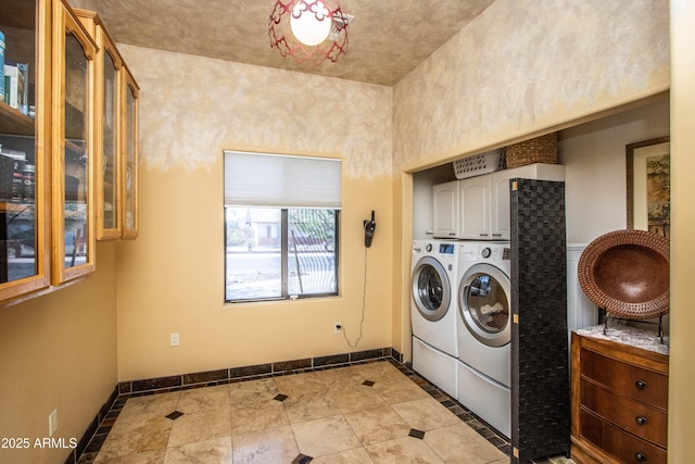 6334 E Albany St, Mesa, AZ 85205 - laundry room featuring washing machine and clothes dryer, cabinet space, baseboards, and inlaid floor details