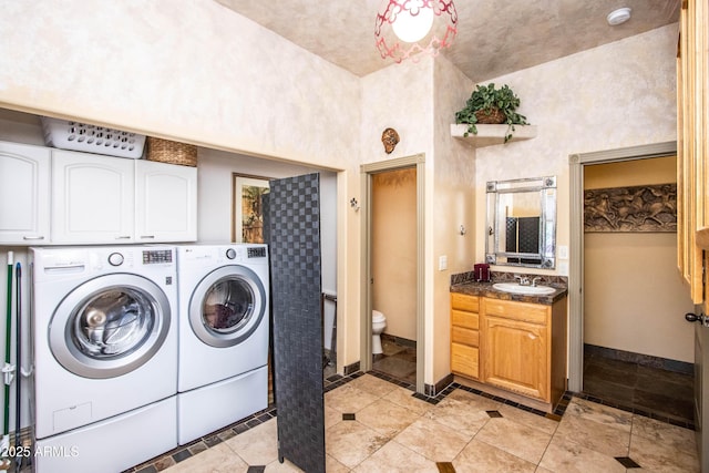 6334 E Albany St, Mesa, AZ 85205 - laundry room with washing machine and clothes dryer, a high ceiling, and baseboards