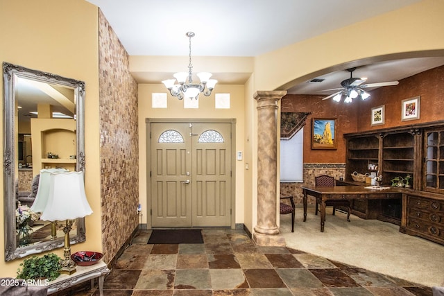 6334 E Albany St, Mesa, AZ 85205 - entrance foyer featuring decorative columns, arched walkways, a ceiling fan, and dark stone finish floors