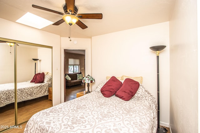 6334 E Albany St, Mesa, AZ 85205 - bedroom with wood finished floors, a closet, and ceiling fan