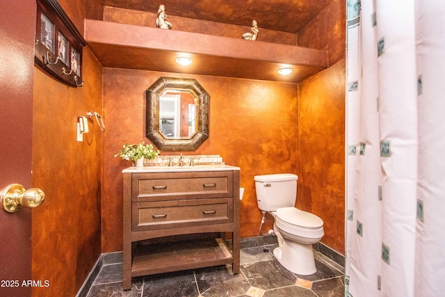 6334 E Albany St, Mesa, AZ 85205 - bathroom featuring vanity and toilet