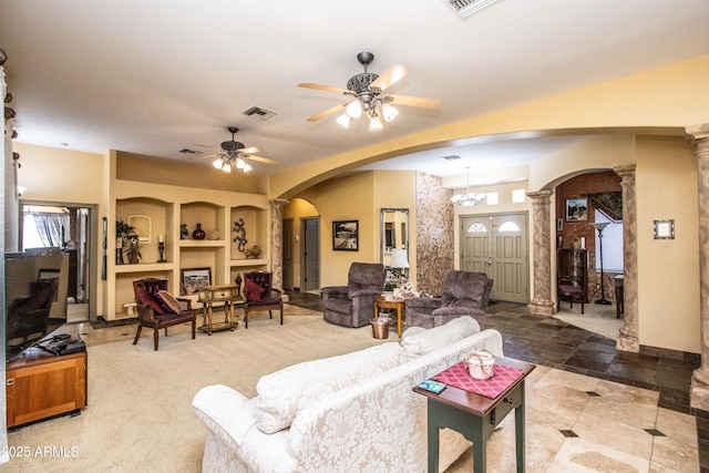 6334 E Albany St, Mesa, AZ 85205 - living area featuring arched walkways, decorative columns, ceiling fan, and plenty of natural light
