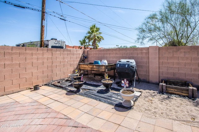 6334 E Albany St, Mesa, AZ 85205 - fenced backyard featuring area for grilling and a patio